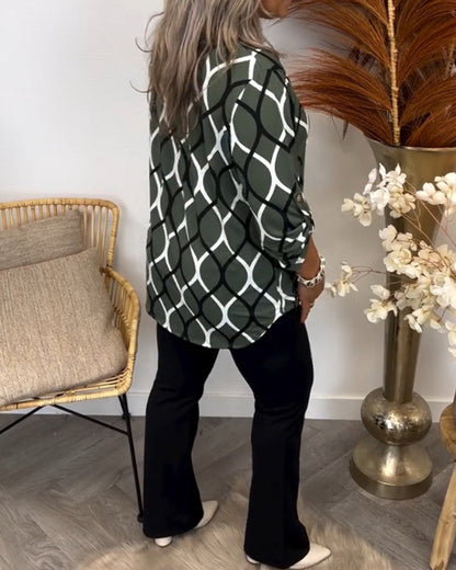 NORA | Blusa che valorizza la figura con un elegante motivo